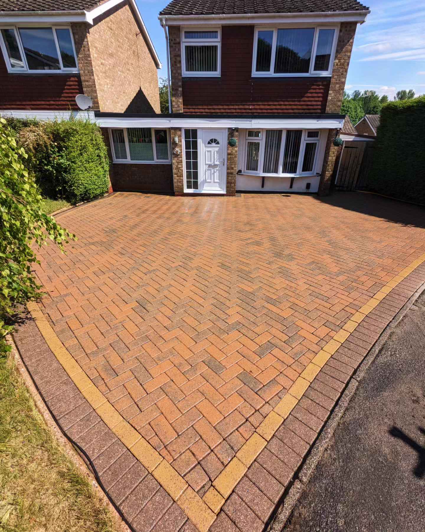 Herringbone block paving driveway cleaned by jet washing professionals